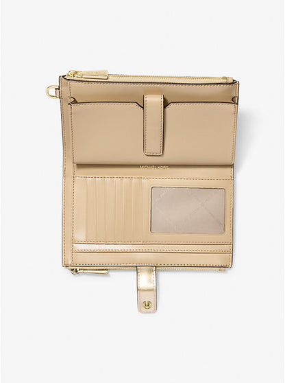 Michael Kors Doppelzipp Portmonee in Pale Gold
